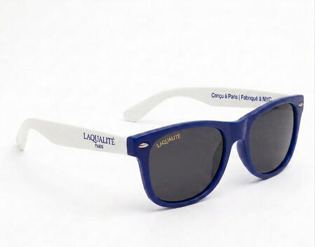 LaQualite Essentials A refined, nautical-inspired take on our signature silhouette. Featuring a deep navy chassis and crisp white arms, this colorway balances Parisian sophistication with a sharp, modern edge.